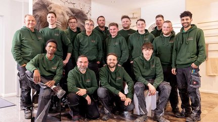 Gruppenbild der Monteure und Kundendienstmitarbeiter von Heinz Tesch